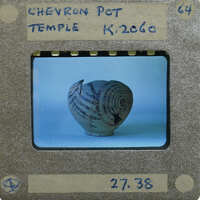 Partially reassembled pot with circular and chevron painted decoration K.2060.