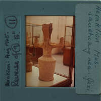 Ancient artifact displayed in a museum case.