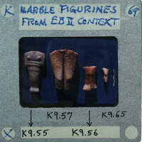 Various marble figurine body fragments, torso, legs, back, leg.