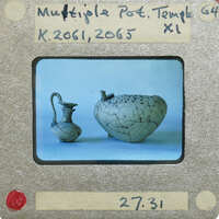 Two reassembled pots, whole jug on left and partial bowl on right, K.2061, K.2065.