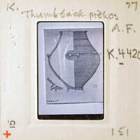 Black and white image of a vessel with internal structures, possibly an artifact or model.