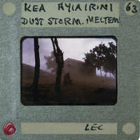 A photograph of a dust storm with trees and buildings, labeled "Kea Ayaireni" and "Just Dust Storm, Meltem".