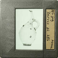 The image shows an antique vase with floral decorations.