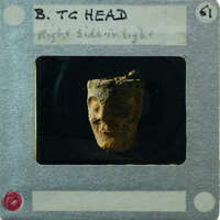 Terracotta figurine face from the front K1.458.