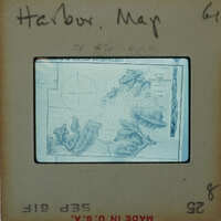 Old photograph of a map with handwritten notes on the border and corners.