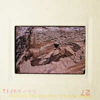 This photo shows an underground cave with various formations and rock structures.