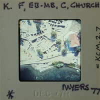 Aerial photograph of an archaeological site with ruins and vegetation.