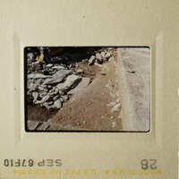 Two photos depicting a construction site with dirt and rocks, showing progress over time.