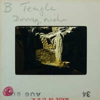 Detail of stone walls from Temple with a doorway and niche.