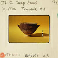 Ancient Greek vase on yellow background.