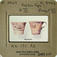 Two clay pots on display.