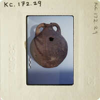 Ancient pottery artifact on display.