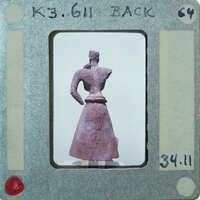 Almost complete terracotta figurine from the back minus right arm.