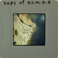 Aerial photo of a historical site on a slide.