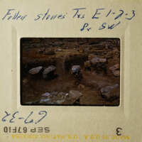 Two photos of rocky terrain, likely part of an archaeological site, with handwritten notes on them.