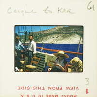 A vintage photo of a man and woman on a boat with a scenic backdrop.