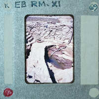 Excavated stone walls and modern drainage system.