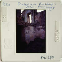 Old building with damaged walls and roof.