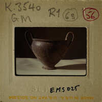 A photograph of an ancient Greek amphora.