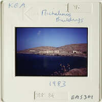 A photograph of an island with houses and a body of water, taken on September 17, 1982.