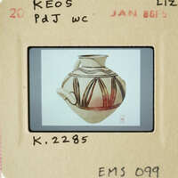 The image shows an antique vase with intricate designs, displayed against a white background.