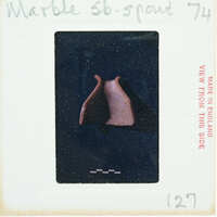 Fragment of stone vase showing spout.