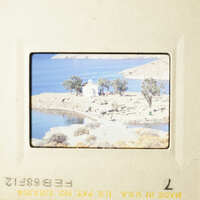 The image shows two pictures, one depicting a serene lake and the other a quaint village by the water.