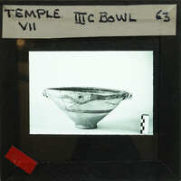 Reassembled decorated bowl in profile.