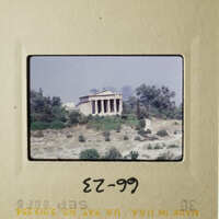 The slide shows an ancient Greek temple with columns, situated on a hill.