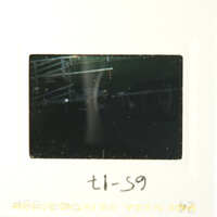This is an image of a film strip with a photograph on it, showing a blurry scene.