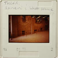 Abandoned building with visible decay and peeling paint on its walls.