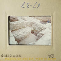 The images show two different scenes, one of an ancient stone structure and the other of a modern building.