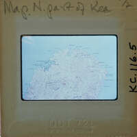 A map showing an island with geographical features and surrounding bodies of water.