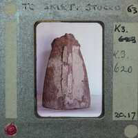 Terracotta figurine fragment of skirt with surface covering K3.620.