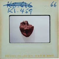 Fragment of terracotta face showing lower half K1.459.