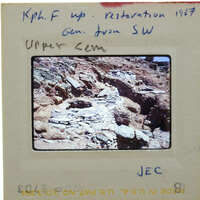A photograph of a rocky landscape with annotations on the border.