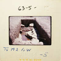 A photograph of an excavation site with dirt and rocks, taken from above.