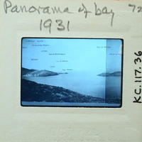 The image is a vintage panoramic photograph of a bay with mountains and buildings, dated 1931.