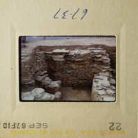 This is an image of two photos, one showing a stone structure and the other a barren landscape with no visible landmarks.