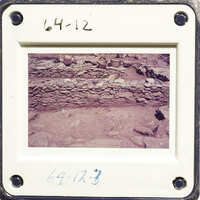 Old photograph of rock formation with annotations on white border.