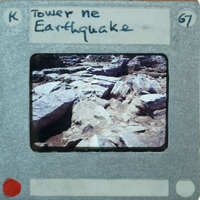 A photograph of a rock slide with an overlaid label indicating it's from the "Tower Ne Earthquake".