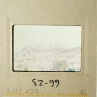 "Two vintage photos on display, featuring cityscapes and landmarks."