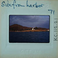 Harbor with a church on a hillside, taken on October 7th, 1962.