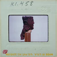 Terracotta figurine face from side K1.458.