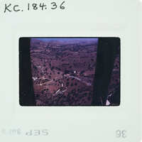 Aerial photo of a landscape on an old film strip.