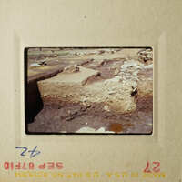 The images show archaeological excavation sites with stone structures and earth mounds, likely taken from an airplane perspective.