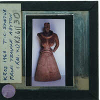 Almost complete terracotta figurine from the front minus right arm.