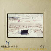 Two photos: an archaeological site with a trench and a pile of dirt, showing historical excavation work.