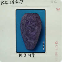 A purple rock on a blue background with labels and numbers.