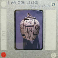 A photograph of an old juig with a cross design